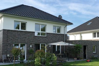 KfW Effizienzhaus 40 Klimaschutzsiedlung NRW Ascheberg, Stadtvilla, Walmdach, Massivhaus