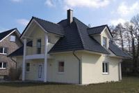 Haustyp Dortmund, Einfamilienhaus mit Walmdach, Balkon, 4 Giebel, Schornstein, Freisitz Terrasse